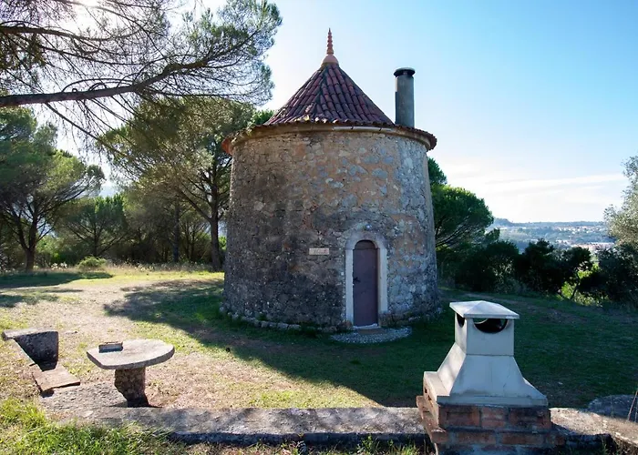 Charming House With Shared Pool In Porto De Mos. Порту-ди-Мош